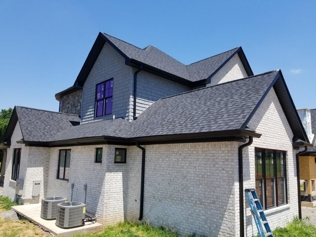 Clarksville Roofing Specials - Recent Roofing Project Newly installed gray shingle roof on a modern home in Clarksville, TN. 
